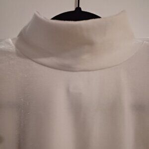 Sure to become a staple! White velour-like sleeveless cowl neck